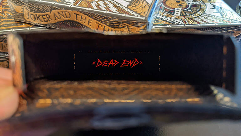The words "Dead End" printed inside the deck's case.