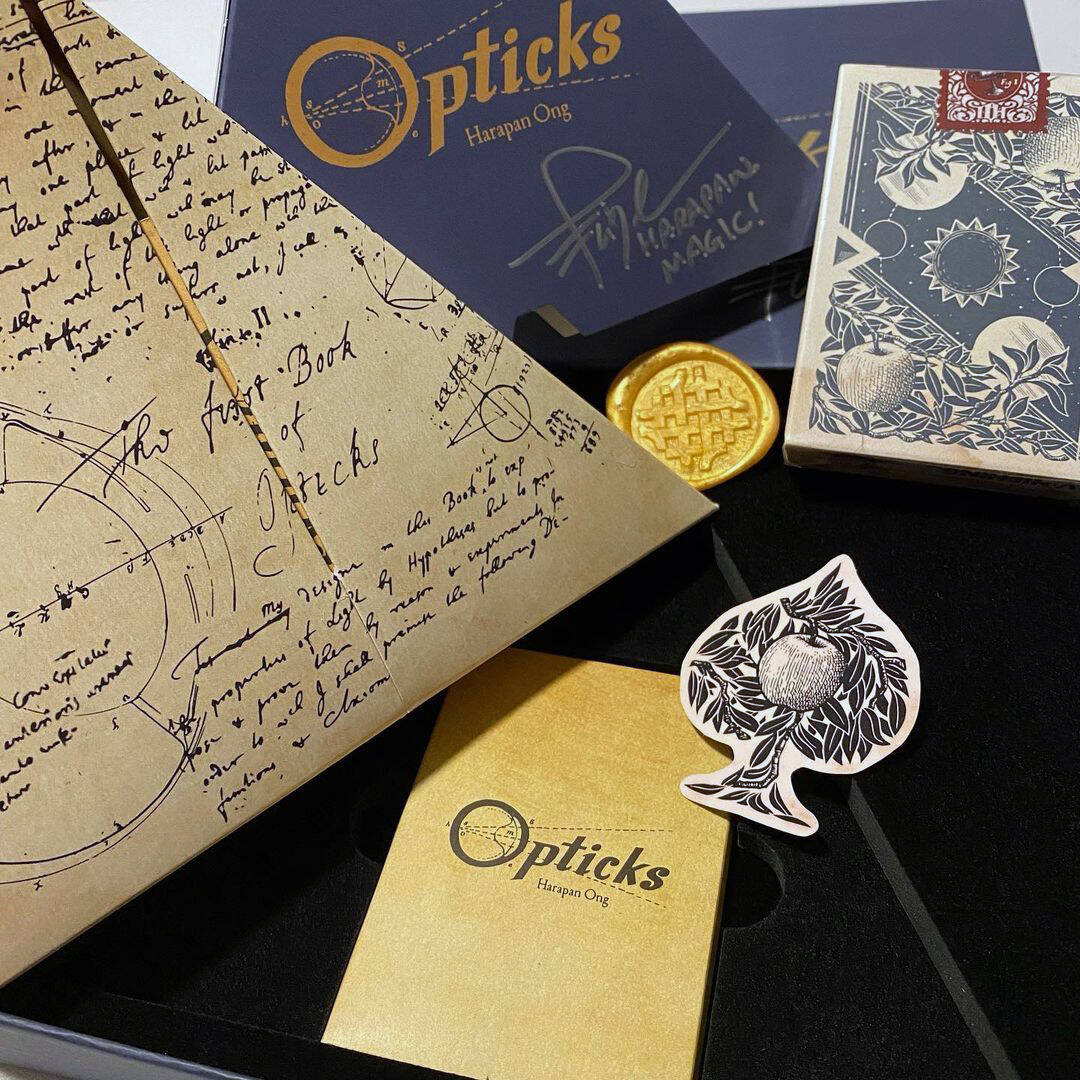 The inside contents of the Opticks box set.