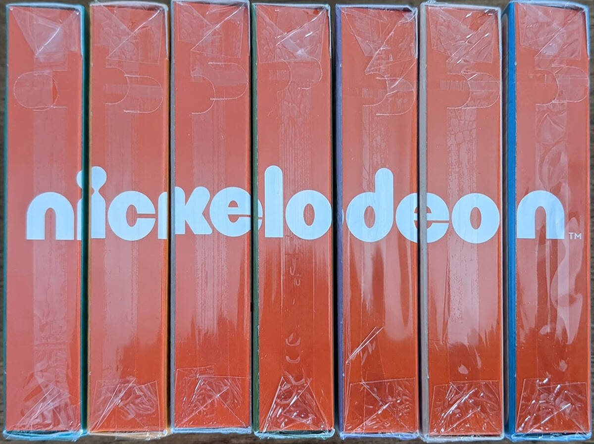 Side view of all 7 Fontaine decks, spelling NICKELODEON