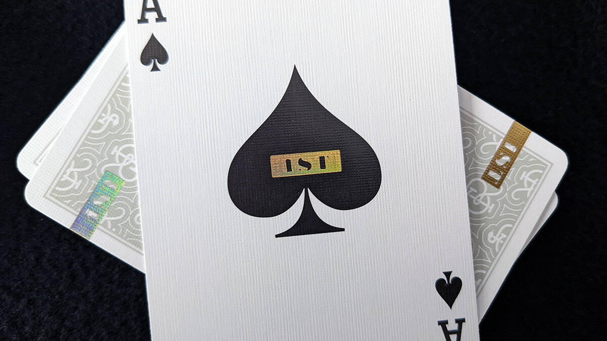 The Ace of Spades sitting on top of the deck
