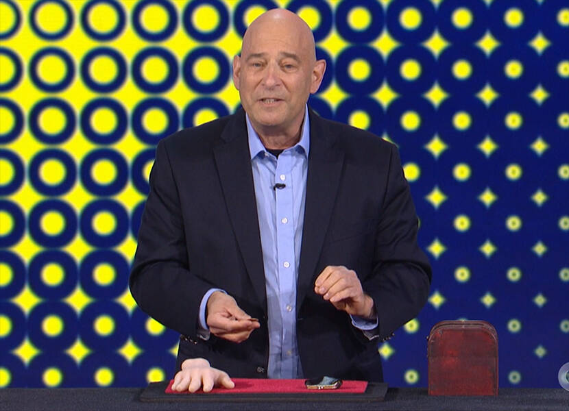 Dr. Michael Rubinstein performing his coin routine on Fool Us.