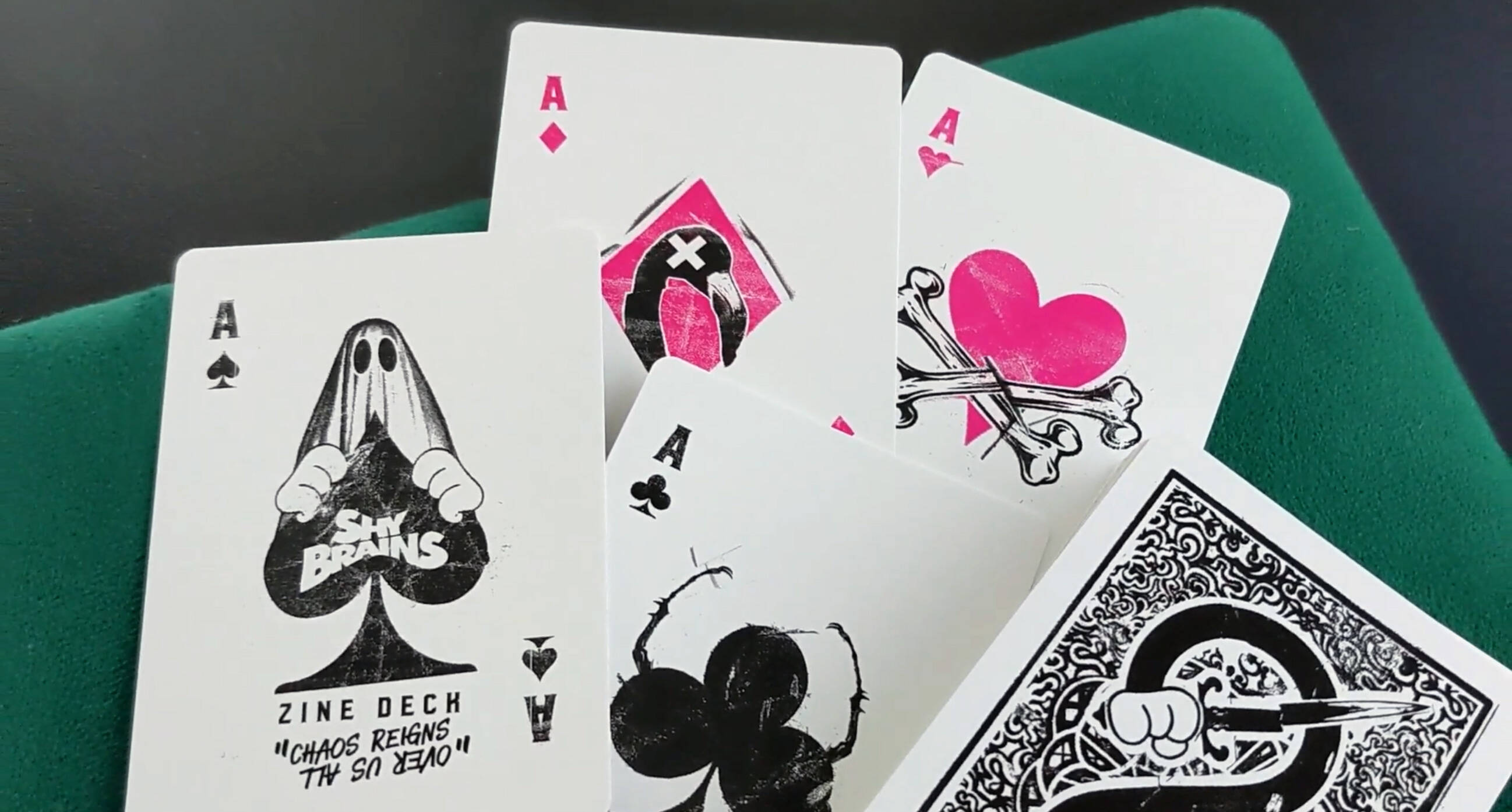 The custom aces in the Zine Playing Cards deck.