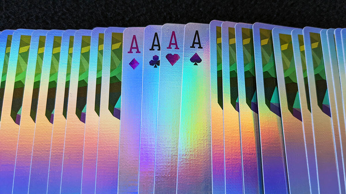 Cards spread in a ribbon showing all four Aces.