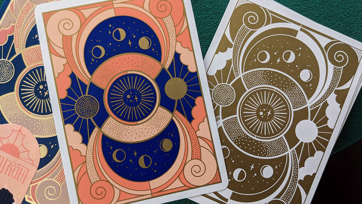 The two different colorways of the Lady Moon Playing Cards decks.
