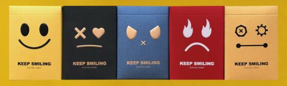 All five decks of Keep Smiling Playing Cards.