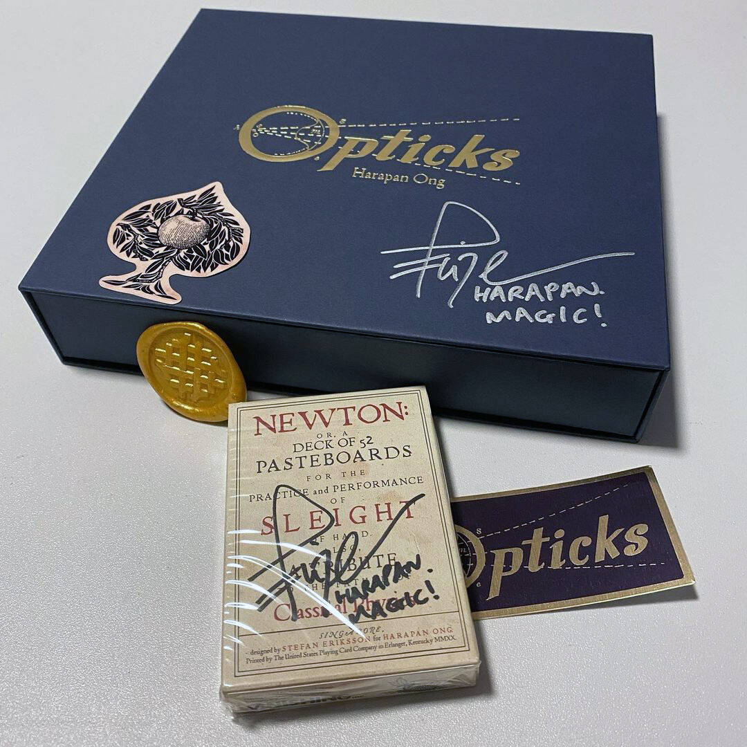 The Opticks box set and deck of playing cards.